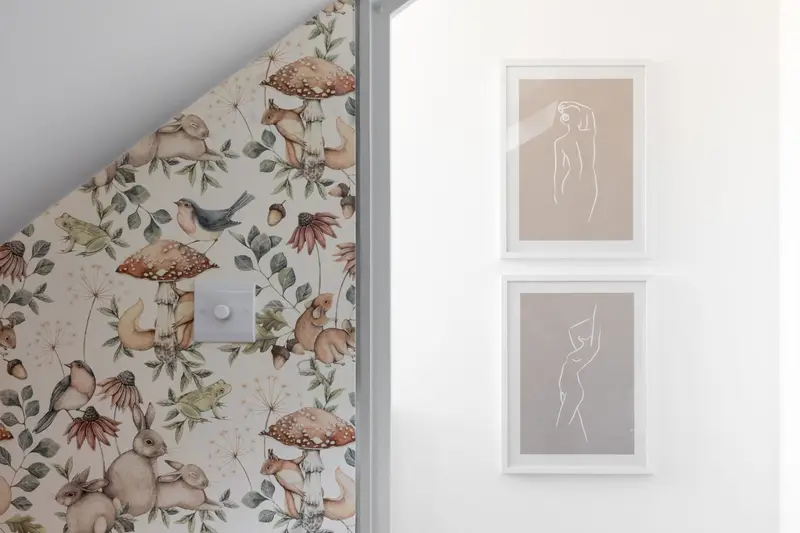 Forest-inspired wallpaper with mushroom and bird motifs