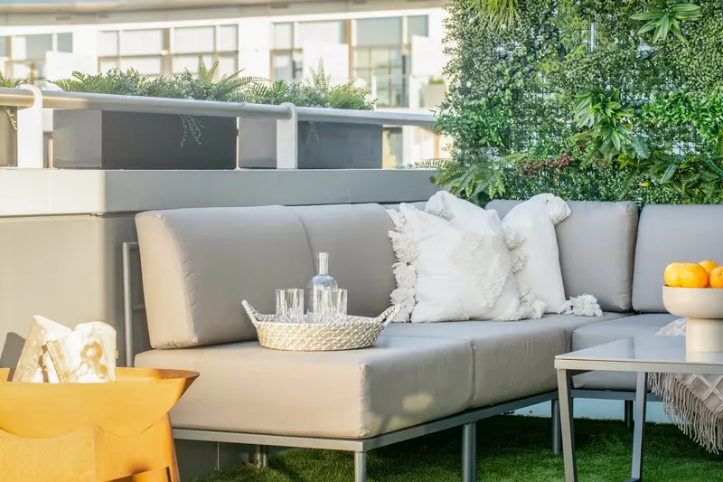 Roof terrace lounge with a living green wall