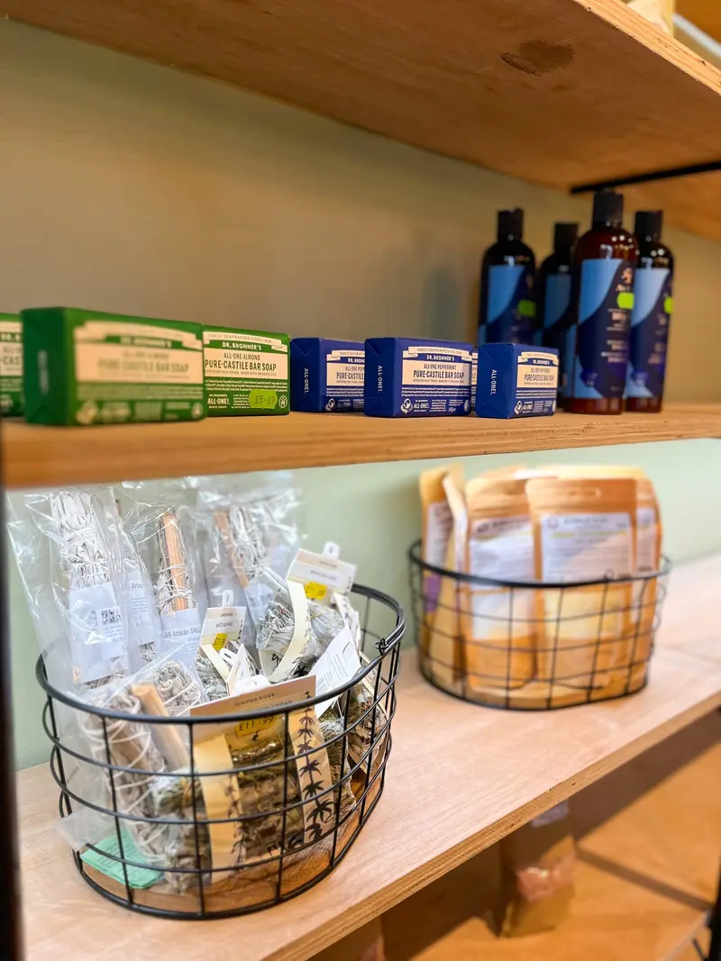 Shelving with herbal products and wire baskets