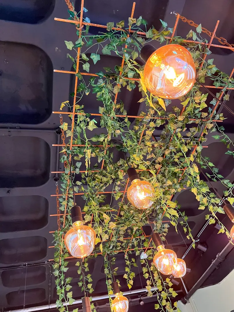 Close-up of the rebar ceiling crown and warm bulbs