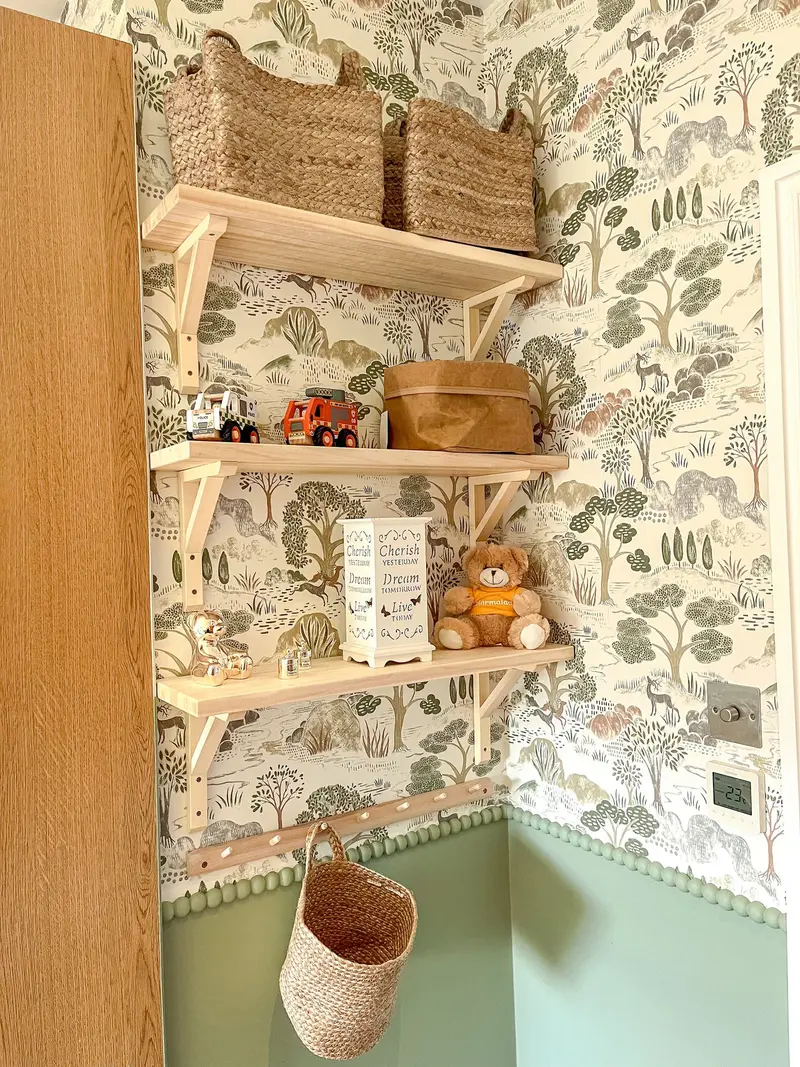 Wooden wall shelves with baskets in a child’s bedroom
