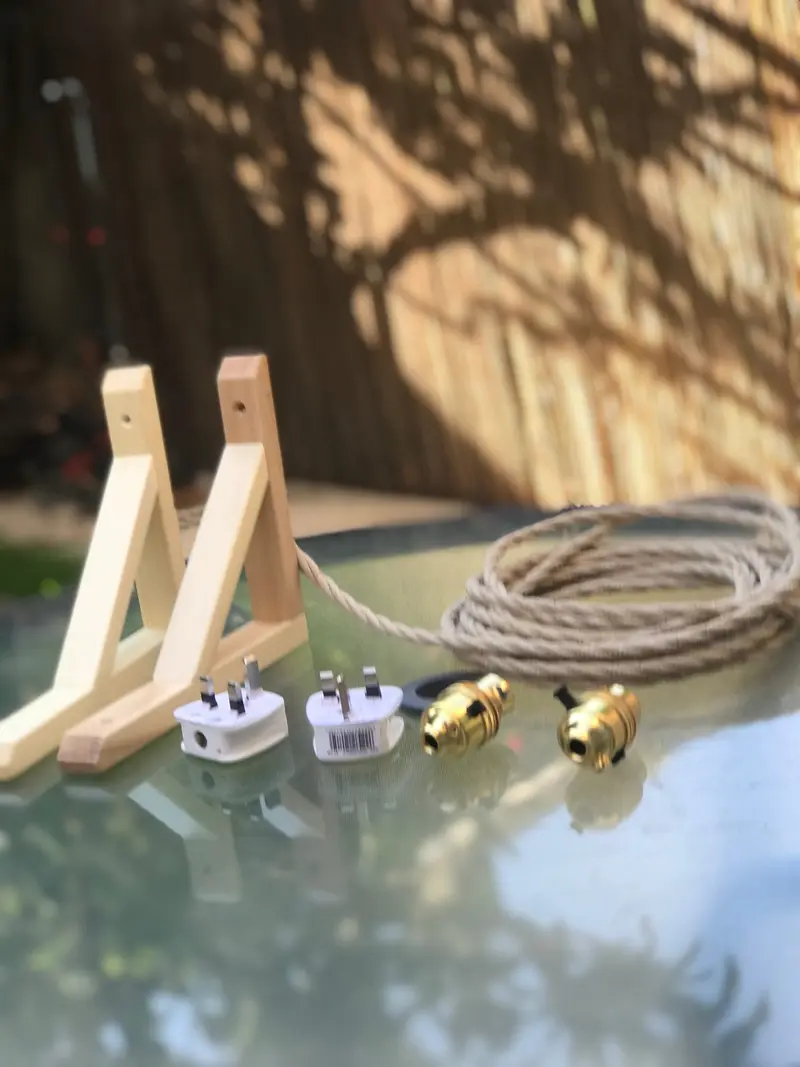 DIY bedside lights made from shelving brackets