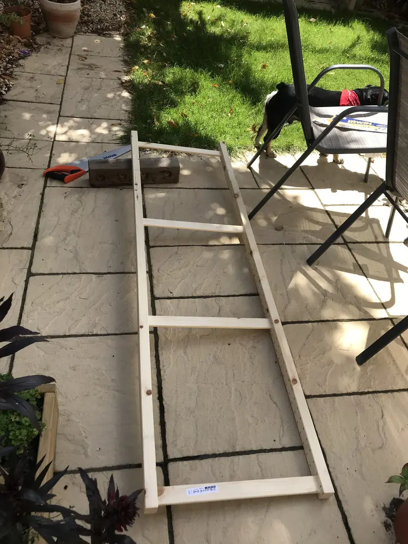 Rattan headboard being made on the patio