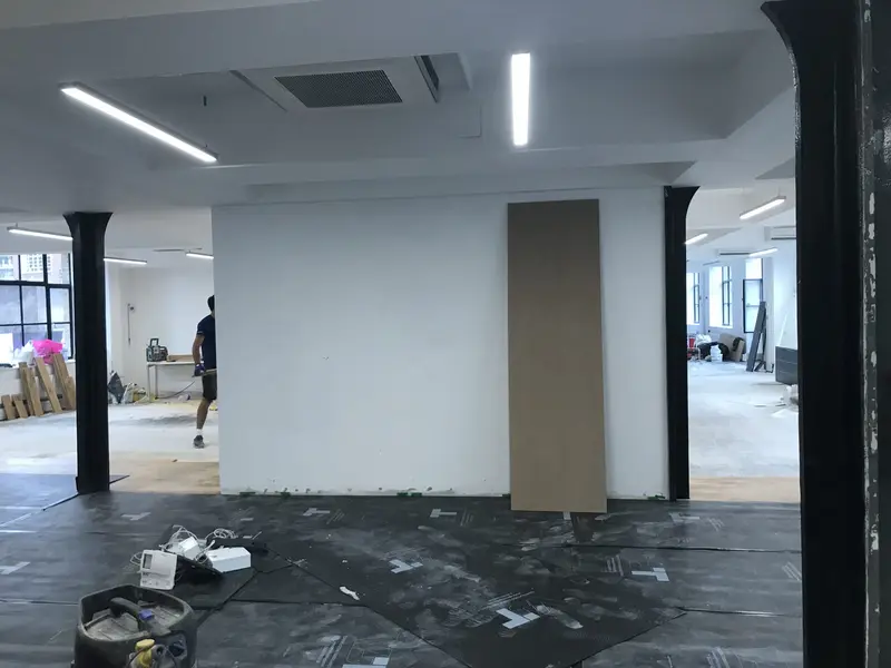 Office before refurbishment with walls being removed